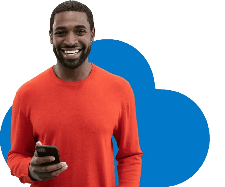 January_campaign_homepage_smiling_man_looking_at_the_camera_holding_phone_2 (1)